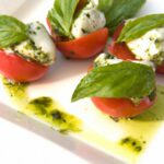 Bite-Sized Bliss: Mini Caprese Salad with Zesty Pesto Twist
